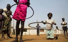 FILE: Children play with hula hoops at the Children Friendly Space, run by Unicef. Picture: AFP.