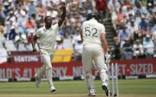 South Africa's Kagiso Rabada (L) celebrates after the dismissal of England's Joe Denly (R) during the first day of the second Test cricket match between South Africa and England at the Newlands stadium in Cape Town on 3 January 2020. Picture: AFP