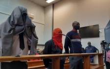 FILE: Scorpion Ndyalvane, Caylene Whiteboy and Voster Netshiongolo on 22 September 2020 made a brief appearance at the Protea Magistrates Court for the alleged murder of 16-year-old Eldorado Park teenager, Nathaniel Julies. Picture: Kgomotso Modise/EWN
