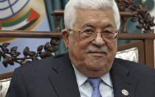 Palestinian leader Mahmud Abbas smiles during his meeting with the Italian foreign minister at the Palestinian Authority's headquarters in the West Bank city of Ramallah on 29 January 2019. Picture: AFP
