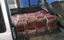 A truck driver (40) was arrested at roadblock with liquor in Kinkelbos on 30 July 2020 and charged under the regulations of the Disaster Management Act. Picture: Twitter/@SAPoliceService
