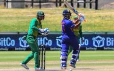India's Rishabh Pant (R) plays a shot as South Africa's wicketkeeper Quinton de Kock looks on during the second one-day international (ODI) cricket match between South Africa and India at Boland Park in Paarl on 21 January 2022. Picture: RODGER BOSCH/AFP