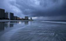 Rain begins to fall as the outer bands of Hurricane Florence make landfall in Myrtle Beach, South Carolina on 13 September 2018. Picture: AFP