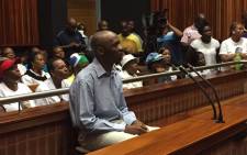Former Jozi FM DJ Donald Sebolai sits in the dock ahead of his sentencing for the murder of his girlfriend Dolly Tshabalala. Picture: Vumani Mkhize/EWN.