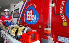 ER24 paramedics attend to a patient. Picture: Supplied
