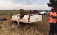 Paramedics found the bakkie lying on its roof on the side of the road. Picture: ER 24