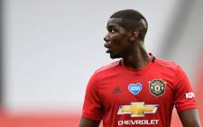 FILE: Manchester United midfielder Paul Pogba reacts during the English Premier League football match between Manchester United and Bournemouth at Old Trafford in Manchester, north west England, on 4 July 2020. Picture: AFP