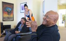 FILE: Archbishop Desmond Tutu with members of staff at the offices of the Desmond and Leah Tutu Legacy Foundation on 24 April, 2013. Picture: Desmond and Leah Tutu Legacy Foundation by Oryx Media.