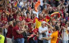 Spain's goalkeeper Unai Simon celebrates with fans their victory at the end of the Uefa Euro 2020 round of 16 football match between Croatia and Spain at the Parken Stadium in Copenhagen on 28 June 2021. Picture: Martin Meissner / POOL / AFP