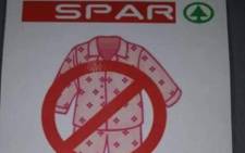 A supposed Spar notice has gone viral on social media, sparking debate on whether or not PJs are an appropriate choice of clothing when popping into your local store. Picture: Facebook.