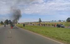 Some community members protest in Orange Farm on 4 December 2017. Picture: @Black1stLand1st/Twitter