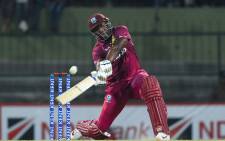 West Indies' Andre Russell plays a shot during the second Twenty20 international cricket match of a two-match series between Sri Lanka and West Indies at the Pallekele International Cricket Stadium in Kandy on 6 March 2020. Picture: AFP