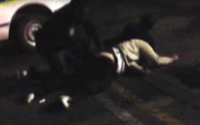 Police officers allegedly assaulted two men. Picture: YouTube Screengrab.