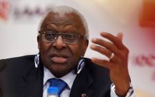 This file photo taken on 21 August, 2015 shows outgoing International Association of Athletics Federations (IAAF) president Lamine Diack speaking during a press conference in Beijing ahead of the 2015 IAAF World Championships. Picture: AFP.