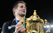 FILE: Richie McCaw holds the Webb Ellis Cup after leading New Zealand to the Rugby World Cup title. Picture: AFP