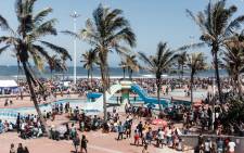 A general view taken on 1 January 2022 shows thousands of New Year's Day revellers and holidaymakers gathering on the South Beach during New Year festivities in Durban after the government lifted a COVID-19 restriction by removing the midnight to 4am curfew. Picture: Rajesh JANTILAL/AFP