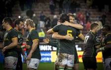 Respective captains and long-time friends Victor Matfield and Bakkies Botha embrace after the Springboks beat the World XV at Newlands on 11 July 2015. Picture: Aletta Gardner/EWN