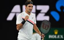 Switzerland's Roger Federer reacts after beating Germany's Jan-Lennard Struff in their men's singles second round match on day four of the Australian Open tennis tournament in Melbourne on 18 January, 2018. Picture: AFP