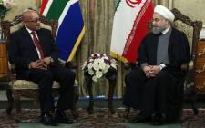 A handout picture provided by the office of Iranian President Hassan Rouhani on April 24, 2016 shows him (R) meeting with South African President Jacob Zuma at the presidential palace in the capital Tehran. Picture: AFP/IRANIAN PRESIDENCY