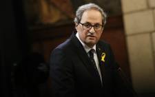 Catalan regional president Quim Torra delivers a speech during an official swearing-in ceremony for the new government at the Generalitat Palace in Barcelona on 2 June 2018. Picture: AFP.