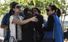 FILE: Families of passengers who were flying in an EgyptAir plane that vanished from radar en route from Paris to Cairo react as they wait outside a services hall at Cairo airport on 19 May, 2016. Picture: AFP.