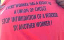 Message on the t-shirt of a mineworker at the first NUM rally to be held in Marikana since 2012 on Sunday, 17 November 2019. Picture: NUM/Twitter