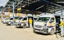 Taxis at a Gauteng taxi rank being disinfected as part of measures to protect public transport commuters from contracting COVID-19. Picture: @vm_africa/Twitter