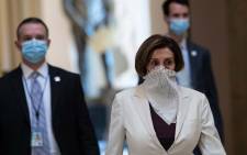 FILE: US House Speaker Nancy Pelosi (R)walks out of the chamber of the US House of Representatives after the debate on the additional 484 billion dollar relief package amid the coronavirus pandemic at the US Capitol in Washington, DC, on 23 April 2020. Picture: AFP.

