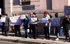 A small group of people have gathered outside the Cape Town Magistrates Court in support of an alleged gang boss, Ralph Stanfield. Picture: Chanel September/EWN.
