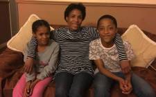 Zainaldo de Bruin pictured with his mother and relative at their Carnarvon home. Picture: Leanne de Bassompierre.
