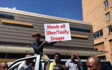 Uber and Taxify drivers are seen on Friday 9 March 2018 protesting against the murder of one of their fellow drivers. Picture: Ihsaan Haffejee/EWN