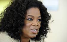 FILE: US talk show queen Oprah Winfrey answers to journalist's questions at her South African girls' academy on January 13, 2012 in Henley on Klip. Winfrey founded the $40-million school for girls in 2007. Picture: AFP