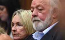 Barry and June Steenkamp, parents of Reeva Steenkamp, listen as judgment is handed down in the murder trial of Oscar Pistorius at the High Court in Pretoria on 11 September 2014. Picture: Pool.