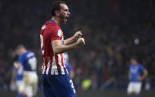Atletico Madrid's Uruguayan defender Diego Godin celebrates after scoring during the Spanish league football match between Club Atletico de Madrid and Athletic Club Bilbao at the Wanda Metropolitano stadium in Madrid on 10 November 2018. Picture: AFP.