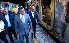Transport Minister Fikile Mbalula on 28 November 2019 visited Cape Town Train Station after 18 train carriages were destroyed in a fire. Picture: @MbalulaFikile/Twitter