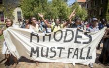 Using the slogan "Rhodes Must Fall" some students are demanding the Cecil John Rohodes statue must be taken down on the University of Cape Town's campus, as it represents institutional racism. Picture: Thomas Holder/EWN.