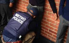 FILE: Cape Town Metro police officials carried out drug raids at Walmer Secondary School on 15 May 2014. Picture: Lauren Isaacs/EWN.