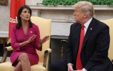 US President Donald Trump announces that he has accepted the resignation of Nikki Haley as US Ambassador to the United Nations, in the Oval Office on 9 October 2018 in Washington, DC. Picture: AFP
