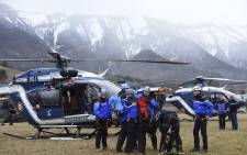 Rescuers prepare in a field where the rescue effort is headquartered on 24 March, 2015 in the southeastern French town of Seyne after a German Airbus A320 of the low-cost carrier Germanwings crashed, Picture: AFP