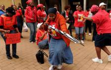 FILE: Workers affiliated to the Communication Workers Union (CWU) strike in Johannesburg on 29 October 2012. Picture: Werner Beukes/SAPA