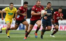 The Crusaders' Brodie McAlister runs the ball into Highlanders territory during their Super Rugby Aotearoa match in Dunedin on 26 February 2021. Picture: AFP