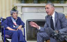 FILE: US President Barack Obama meets with the country’s oldest living veteran, 110-year-old Emma Didlake, in the Oval Office of the White House on 17 July, 2015 in Washington, DC. Picture: AFP.
