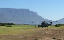 A helicopter makes an emergency landing on Milnerton Golf Club. Picture: Thomas Holder/EWN.