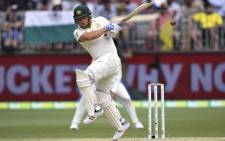 Australia's Aaron Finch gloves a ball down leg from the Indian bowling on the third day of the second cricket Test match in Perth on 16 December 2018.  Picture: AFP
