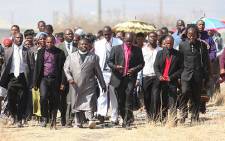 Worshippers gather for a prayer at the scene of the Lonmin shooting on 19 August 2012. Picture: Taurai Maduna/EWN.