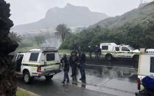 Police monitor the situation in Hout Bay after violent protests by residents on 12 June 2018. Picture: Graig-Lee Smith/EWN