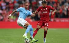 Manchester City defender Kyle Walker (L) fights for the ball with Liverpool midfielder Luis Diaz during the English FA Community Shield football match between Liverpool and Manchester City at the King Power Stadium in Leicester on 30 July 2022. Picture: Nigel Roddis/AFP