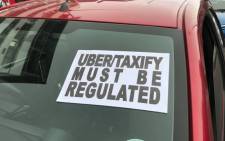 FILE: A message is seen on one of the cars that participated in a protest by Uber and Taxify driver in Green Point, Cape Town. Picture: EWN