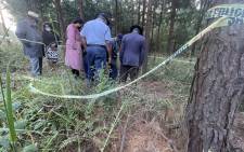Police Minister Bheki Cele and SAPS management receive report from the investigating team at the crime scene where the body of Hillary Gardee was found, just outside Nelspruit. Picture: Lirandzu Themba/Twitter