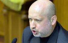 Parliament Speaker and newly-appointed interim president of Ukraine, Olexandr Turchynov, speaks during a session at the Parliament in Kiev on 23 February, 2014. Picture: AFP.